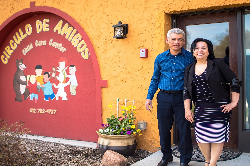 man and woman standing in front of Circulo De Amigos building