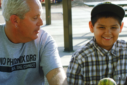 close-up view of a man and boy outside