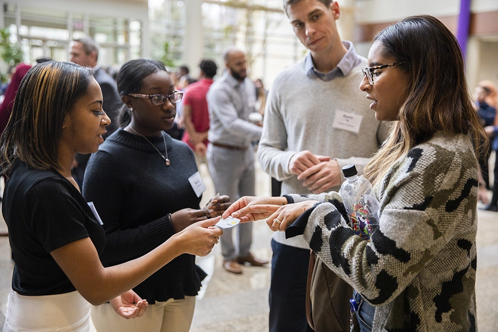 participants at an event at Dougherty Family College