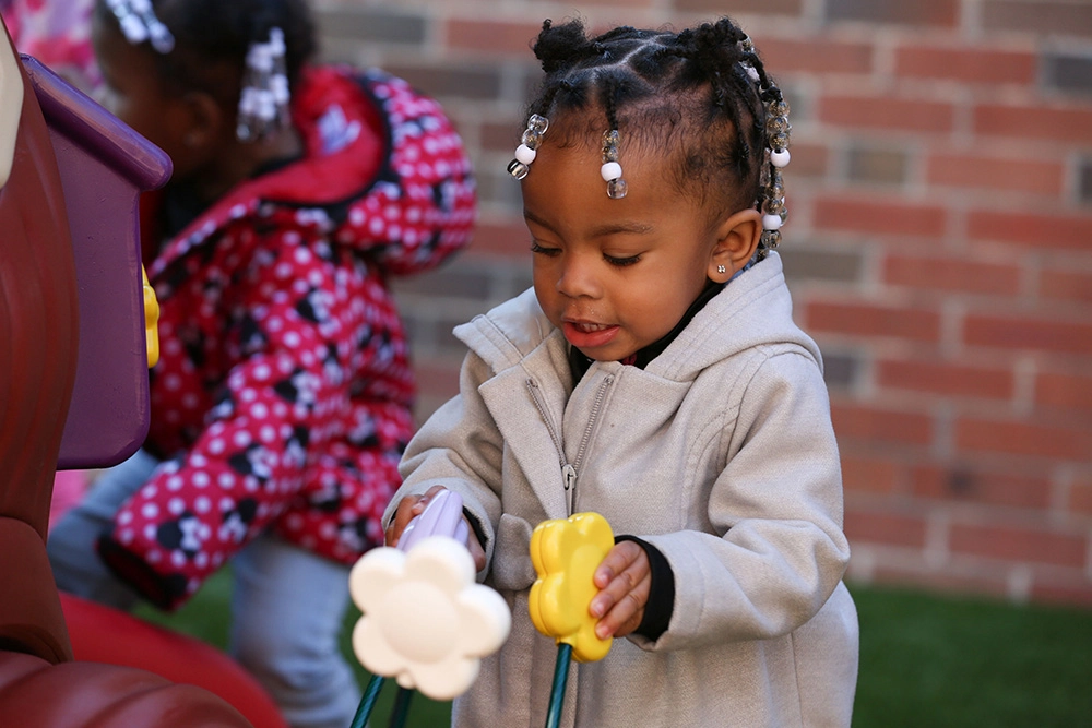 Girl playing outside