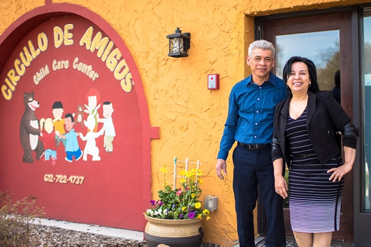 man and woman standing in front of Circulo De Amigos