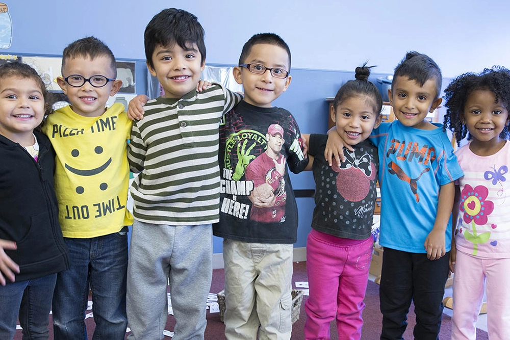 group of toddlers smiling