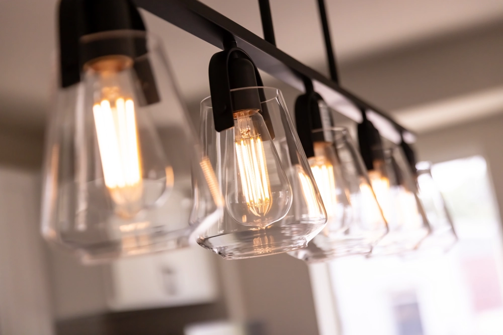 up close view of a light fixture with a row of light bulbs