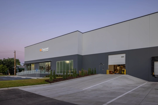 angled corner view of an industrial building front entry