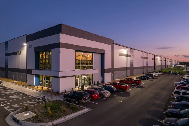 Exterior of entrance to an industrial building at sunset