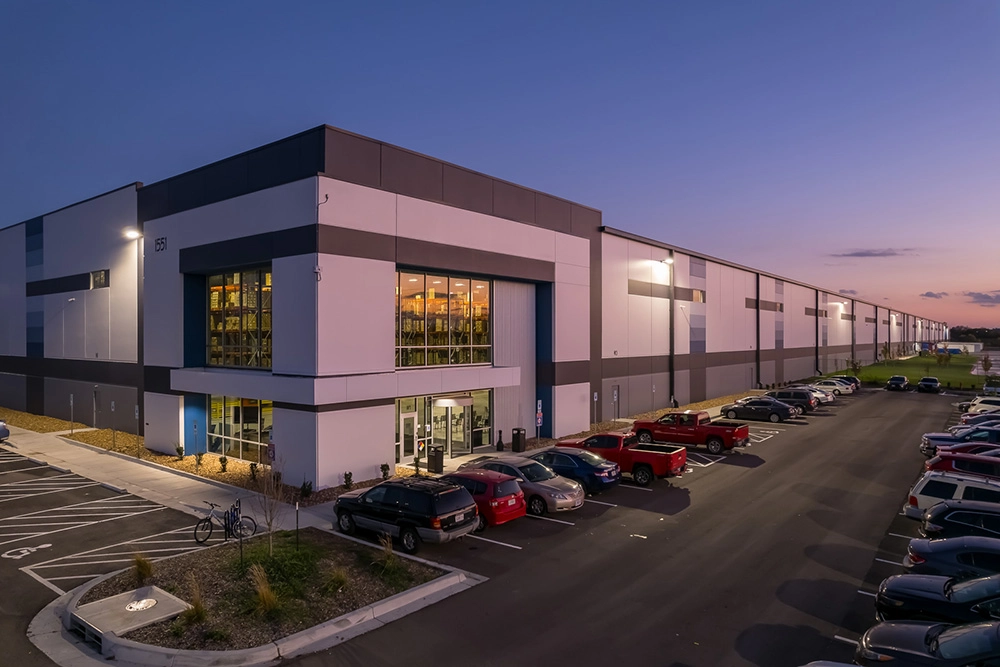 Exterior of entrance to an industrial building at sunset