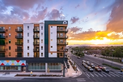 exterior of multifamily building at sunset