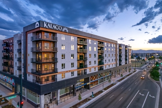 exterior of multifamily building at sunset