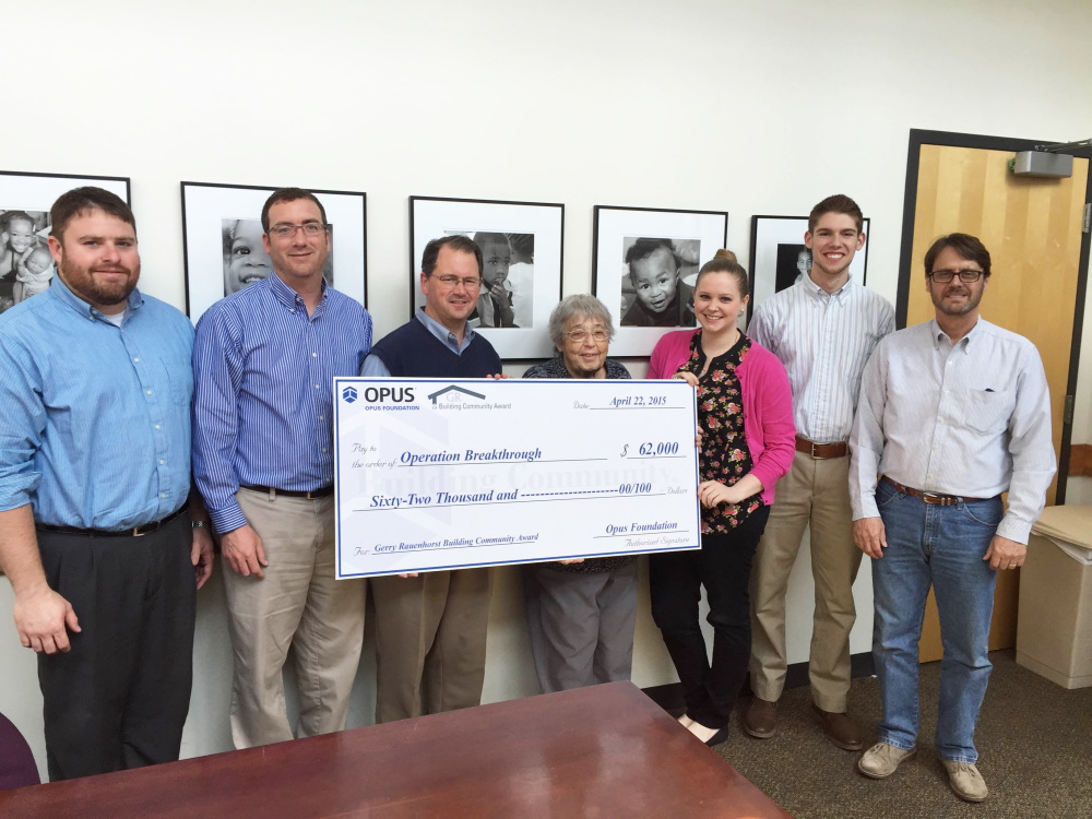 2015 Building Community Award check presentation to Operation Breakthrough