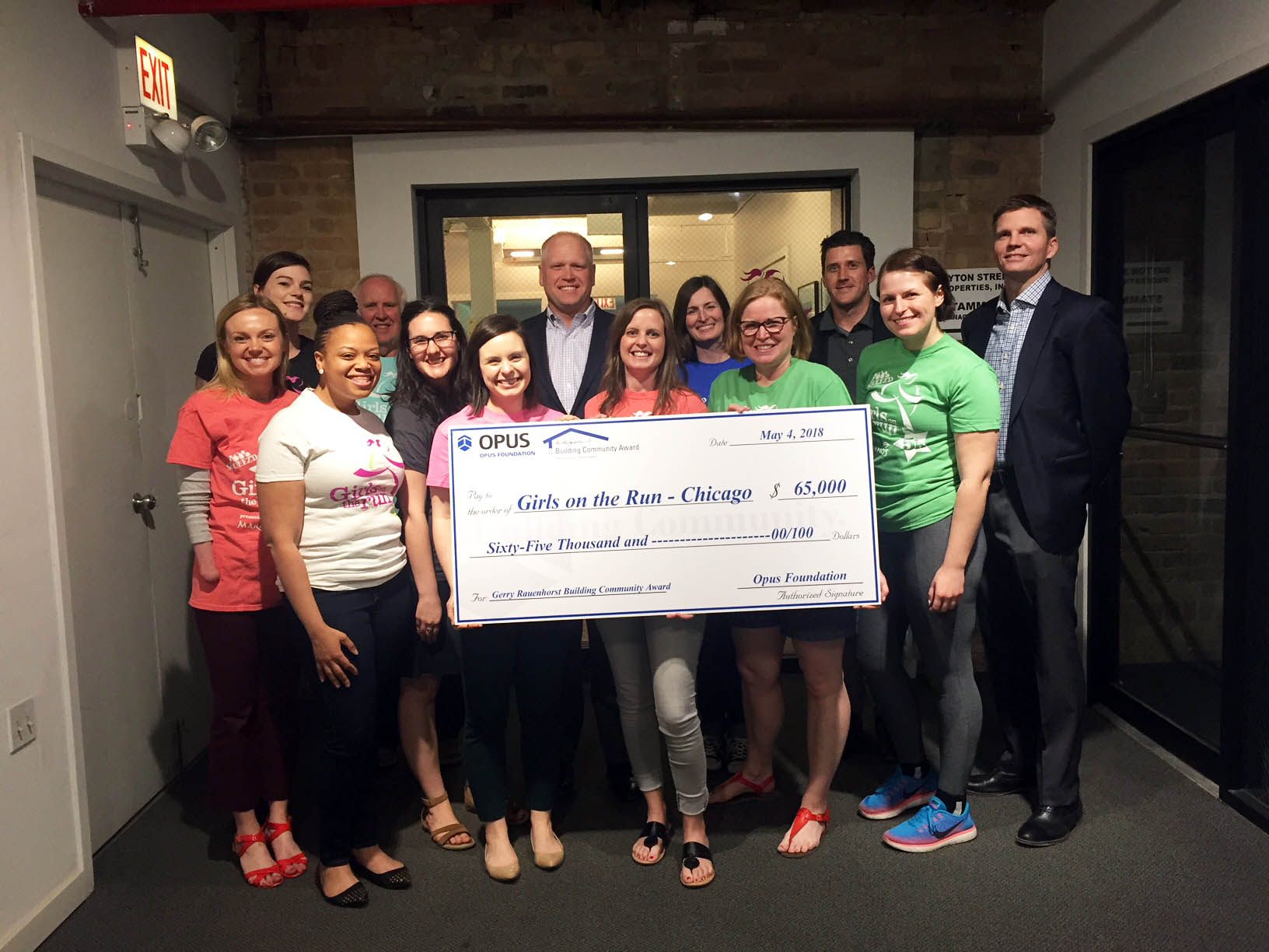 2018 Building Community Award check presentation to Girls on the Run – Chicago