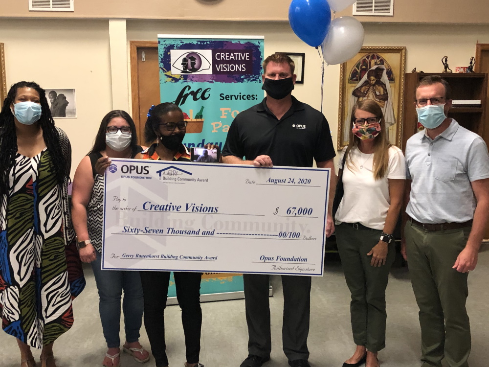 2020 Building Community Award check presentation to Creative Visions